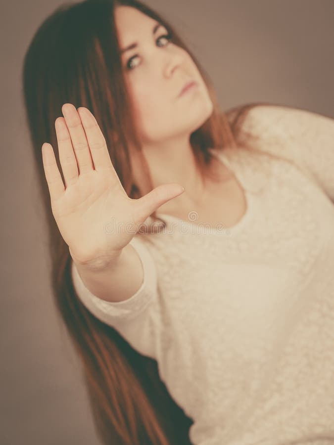 Angry apodicticity woman showing stop with hand stock photos Angry apodicticity woman showing stop with hand stock photos