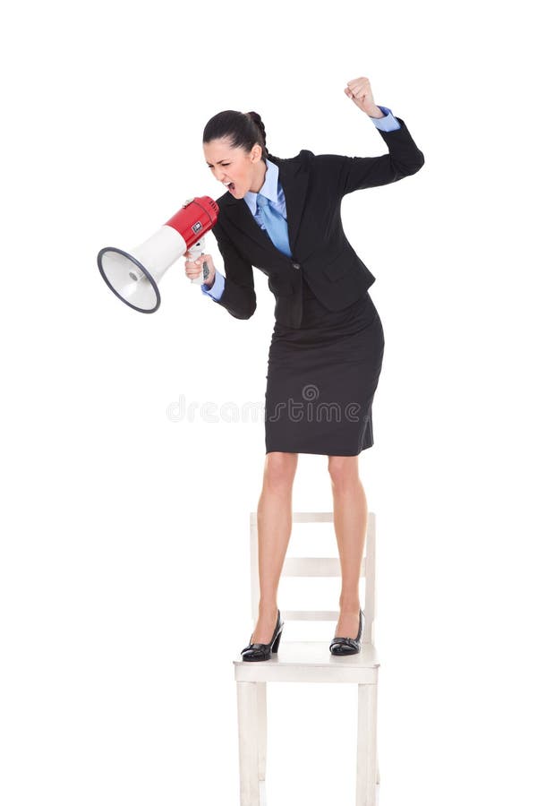 Angry boss with megaphone on chair stock images