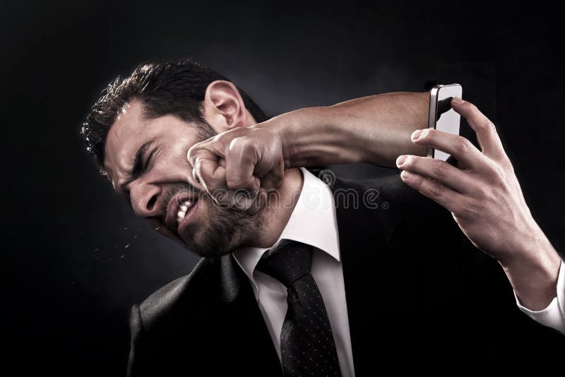 Employee gets punched through smart phone by angry unsatisfied client because of bad service, product, behavior, or attitude. Employee gets punched through smart phone by angry unsatisfied client because of bad service, product, behavior, or attitude