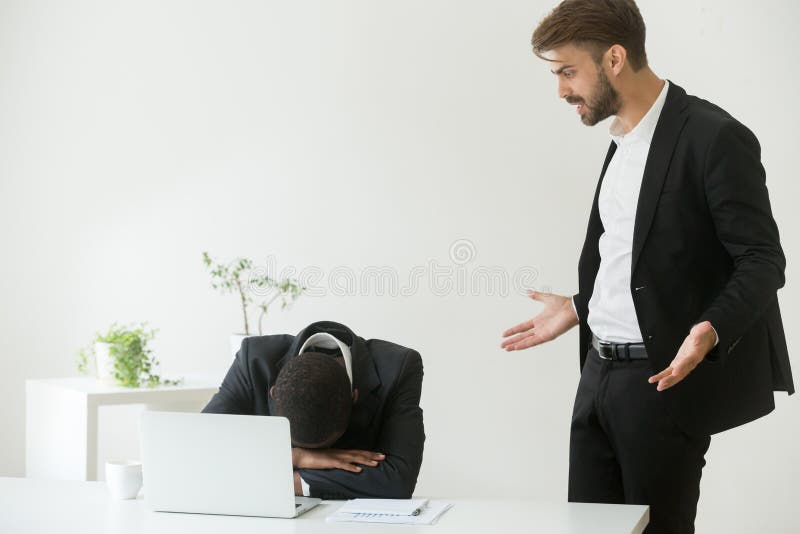 Angry mean caucasian boss shouting scolding frustrated african a stock image Angry mean caucasian boss shouting scolding frustrated african a stock image