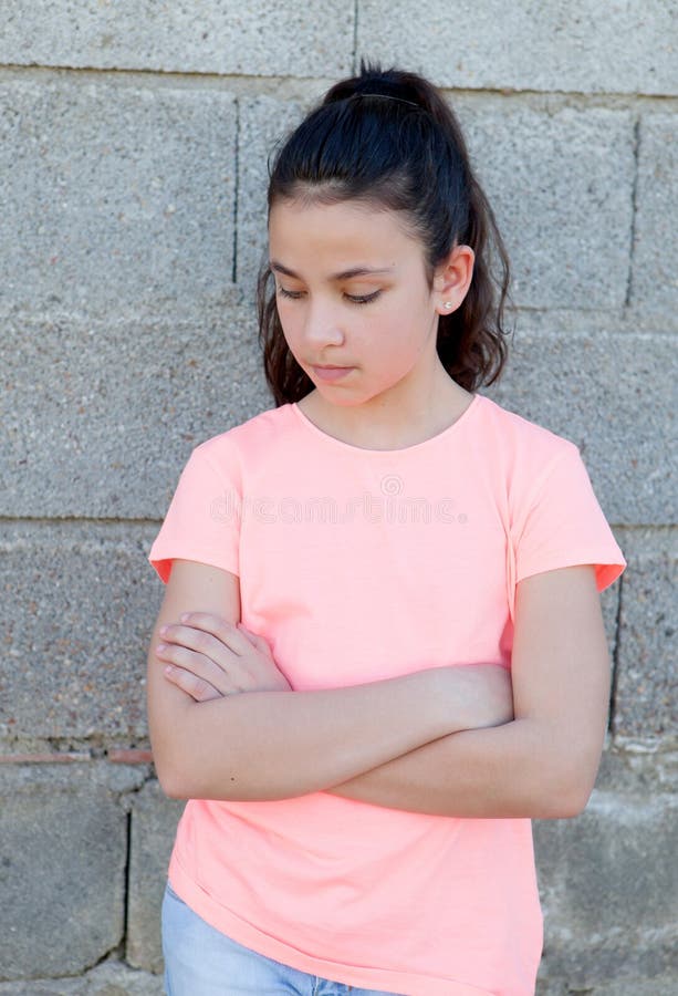 Angry preteen girl in the street stock photography Angry preteen girl in the street stock photography