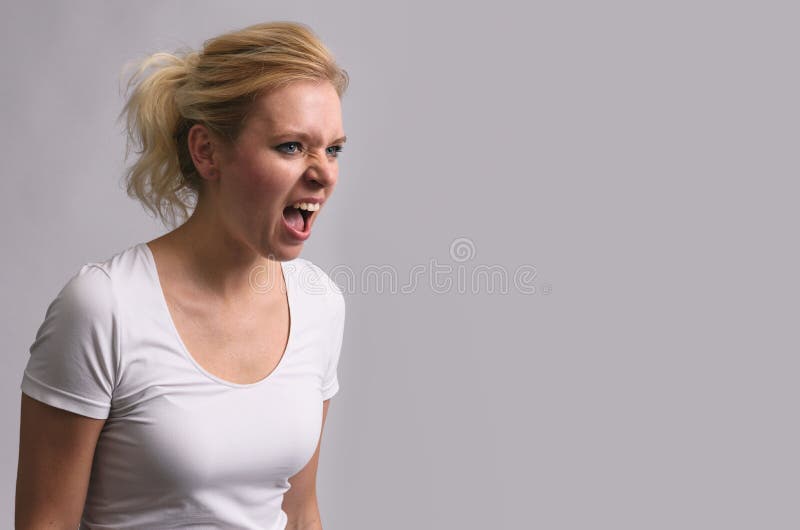 Angry screaming young woman