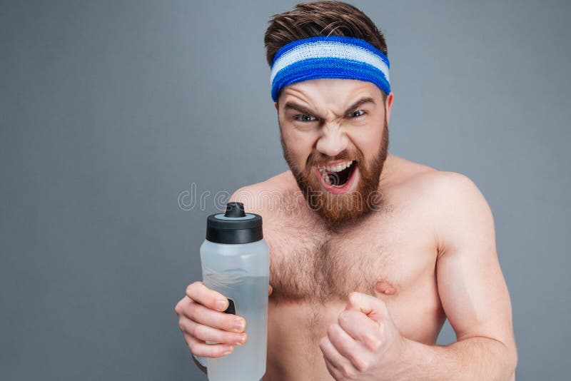 https://thumbs.dreamstime.com/b/angry-shirtless-young-sportsman-holding-bottle-water-shouting-over-grey-background-71614614.jpg
