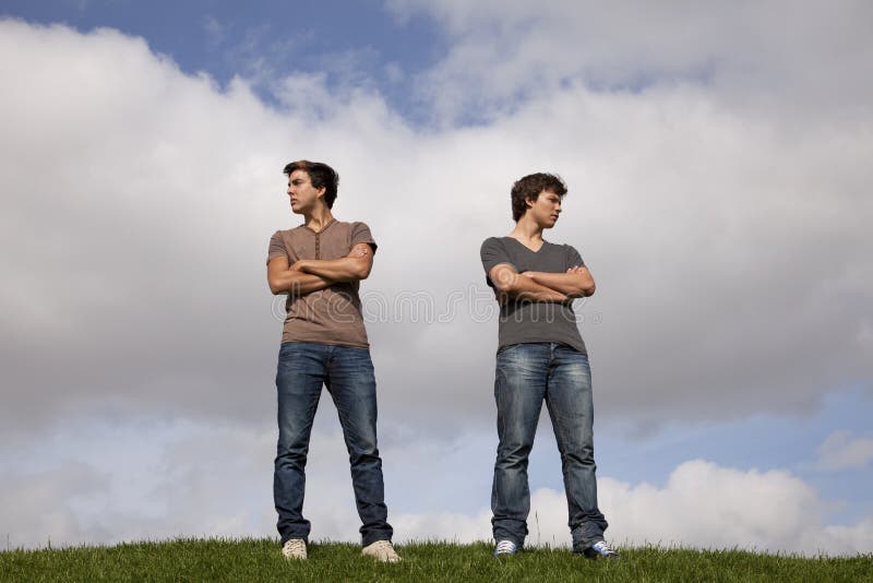 Two friends arguing at the park. Two friends arguing at the park