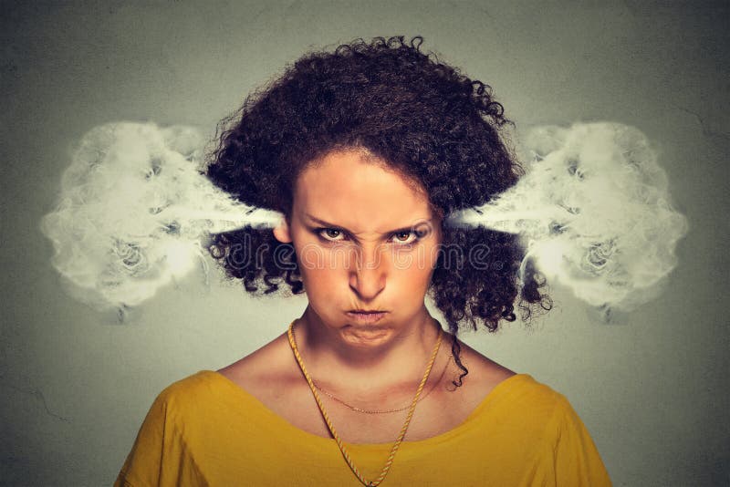 Angry woman, blowing steam coming out of ears royalty free stock photo Angry woman, blowing steam coming out of ears royalty free stock photo
