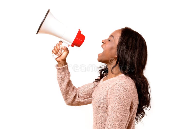Angry young woman yelling into a megaphone stock photos Angry young woman yelling into a megaphone stock photos