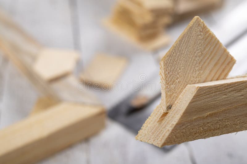 Angular connection of two pieces of wood. Making a wooden frame for a painting. royalty free stock photography