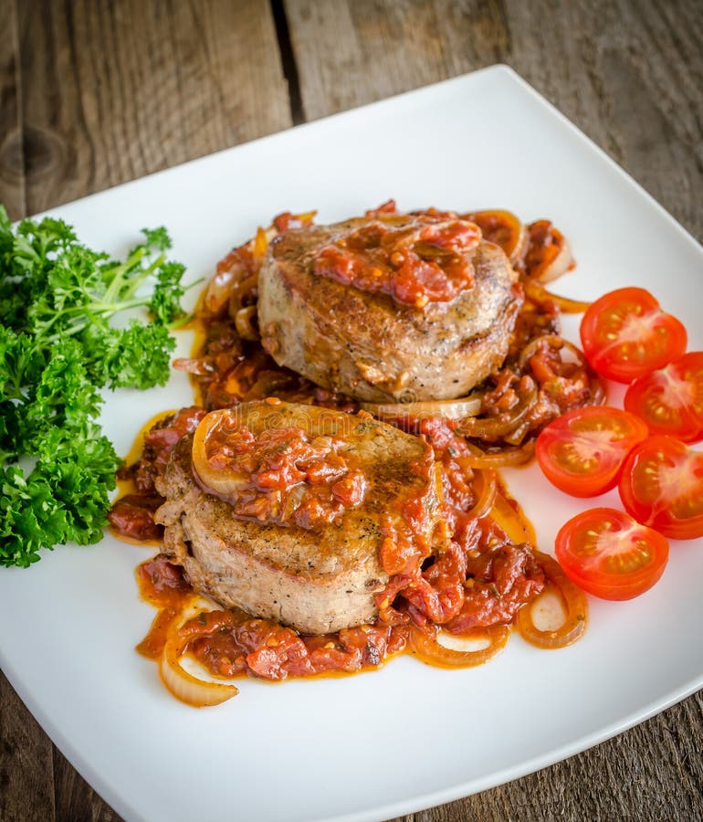 Angus Beef Steaks with Roasted Tomato Sauce Stock Photo Image of