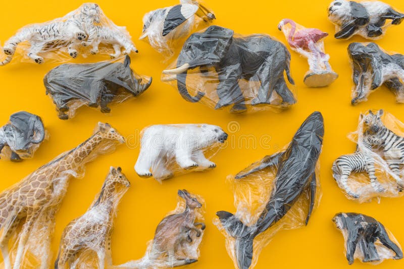 Animals is Entangled in a Plastic Bag. Plastic Animal Concept Stock