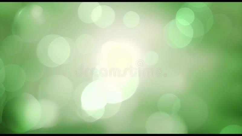 Animation of green light spots moving on green background stock video footage