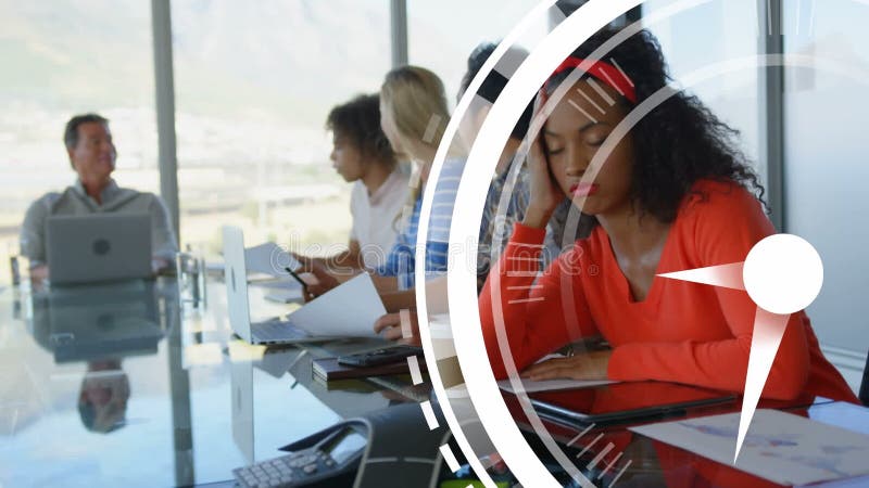 Animation of moving clock over diverse business people at office stock video