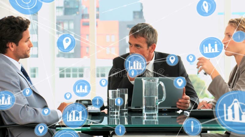 Animation of network of digital icons against group of diverse colleagues discussing at office royalty free illustration
