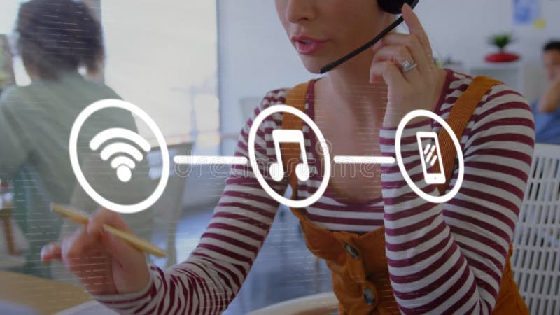 Animation of set of three digital icons over businesswoman with phone headset stock footage