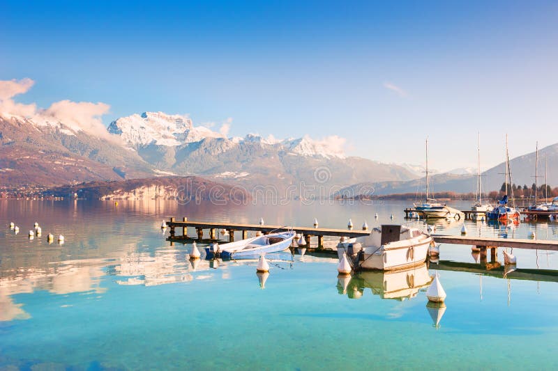 Annecy lake with blue clear water in Alps mountains, France