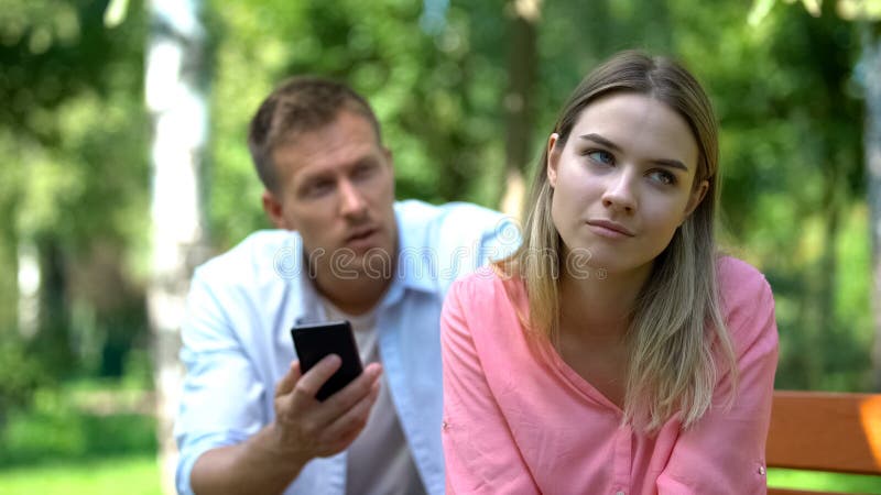 Annoyed Girlfriend Waiting for Boyfriend To Stop Playing Video-games Stock  Photo - Image of game, gamer: 100430632