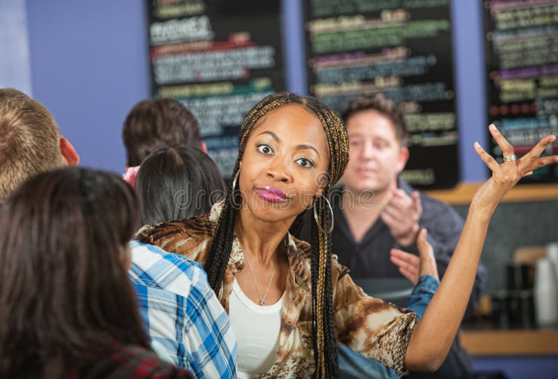 Annoyed young women waiting in line at restaurant. Annoyed young women waiting in line at restaurant