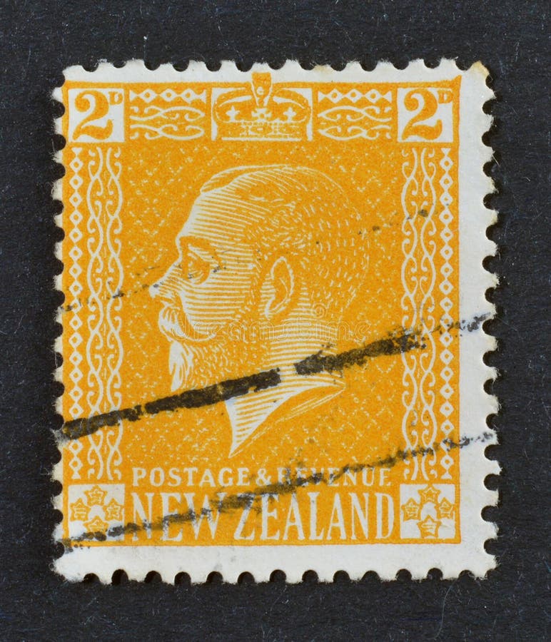 Cancelled postage stamp printed by New Zealand, that shows king George V, circa 1915. Cancelled postage stamp printed by New Zealand, that shows king George V, circa 1915.