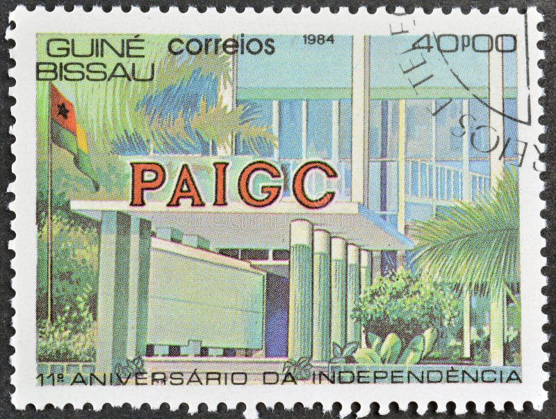 Cancelled postage stamp printed by Guinea Bissau, that shows PAIGC building, 11th Anniversary of Independence, circa 1984. Cancelled postage stamp printed by Guinea Bissau, that shows PAIGC building, 11th Anniversary of Independence, circa 1984.