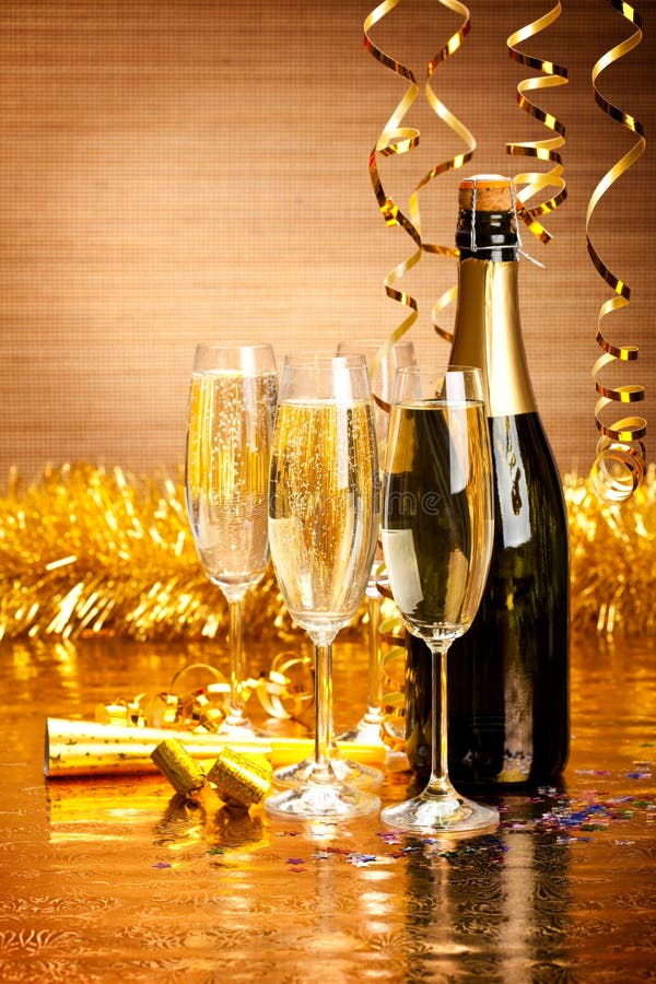 Happy New Year - champagne and party decoration. Happy New Year - champagne and party decoration