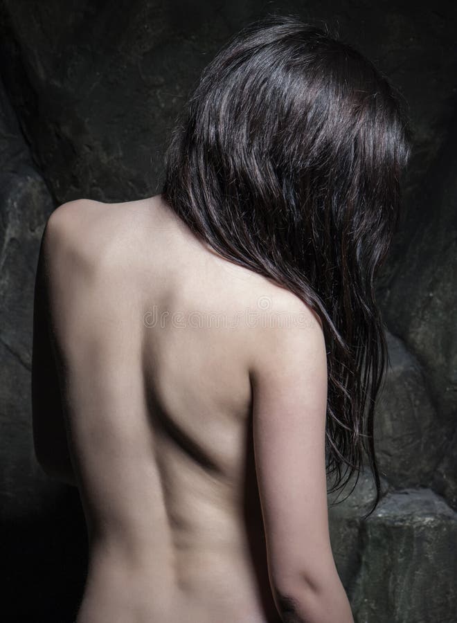 Anonymous attractive back shot of a brunette girl.