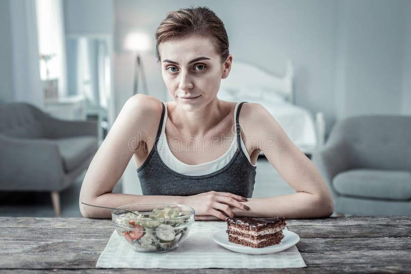 Anorexic Brunette Girl Looking Straight at Camera Stock Image - Image ...