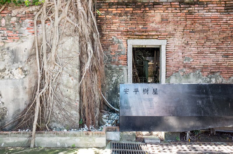 Anping Tree House. This old warehouse is covered by branched of ancient Banyan Tree branch which is