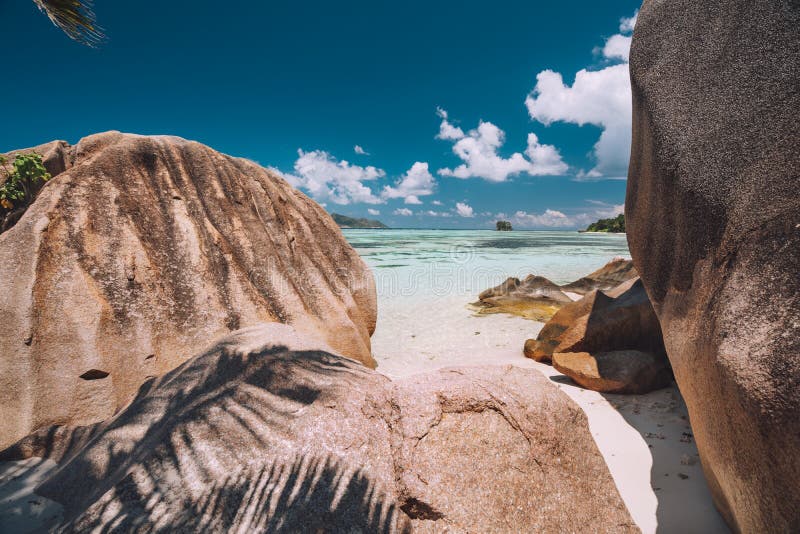 Exotic tropical Anse Source d`Argent beach with granite boulders on island La Digue at Seychelles. Exotic tropical Anse Source d`Argent beach with granite boulders on island La Digue at Seychelles.