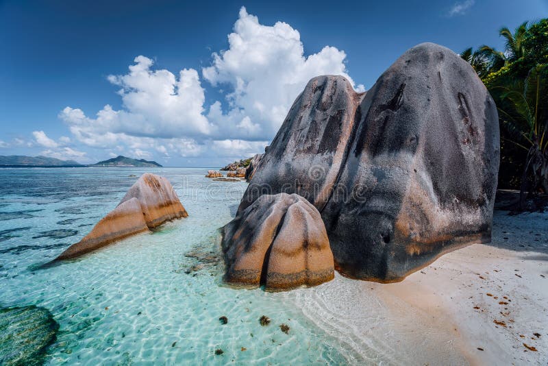 Anse Source d`Argent -amazing tropical beach with huge granite boulders and shallow blue lagoon on La Digue Island, Seychelles. Anse Source d`Argent -amazing tropical beach with huge granite boulders and shallow blue lagoon on La Digue Island, Seychelles.