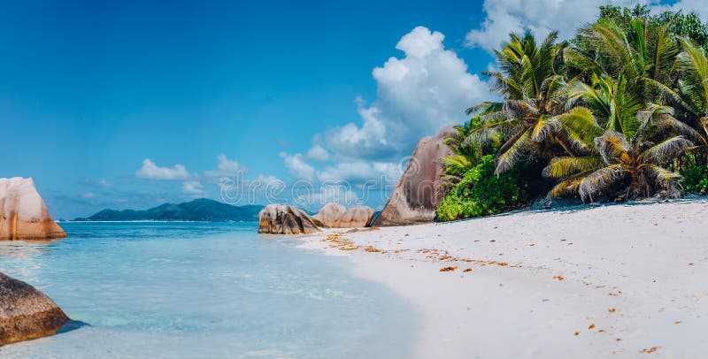 Spectacular Anse Source d`Argent beach on island La Digue in Seychelles. Paradise relaxation summer vacation concept. Panoramic. Spectacular Anse Source d`Argent beach on island La Digue in Seychelles. Paradise relaxation summer vacation concept. Panoramic