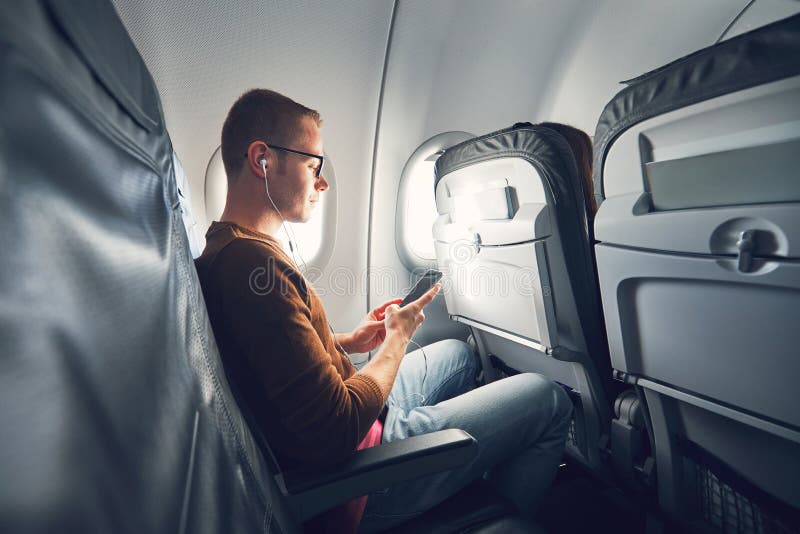 Anslutning i flygplanet arkivbild Anslutning i flygplanet arkivbild