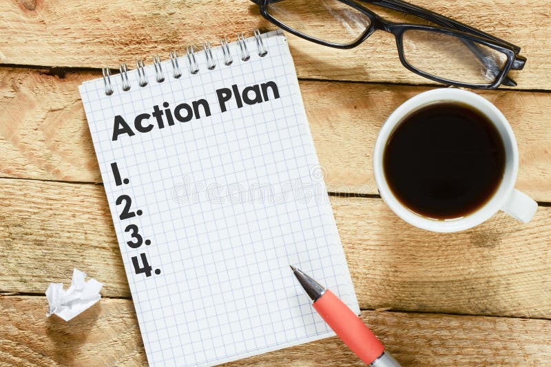 Anteckningsbok med handlingsplanen