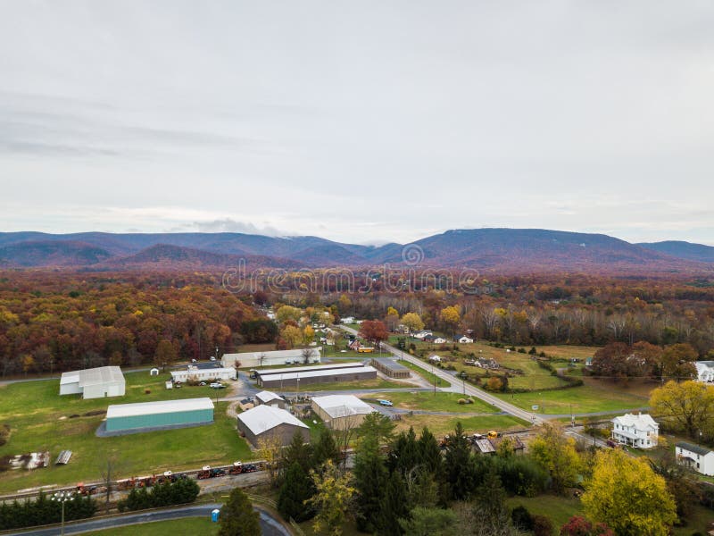 Aerial of the small town of Elkton, Virginia in the Shenandoah Valley with Mountains in the Far Distance. Aerial of the small town of Elkton, Virginia in the Shenandoah Valley with Mountains in the Far Distance
