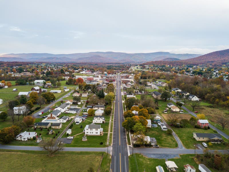 Aerial of the small town of Elkton, Virginia in the Shenandoah Valley with Mountains in the Far Distance. Aerial of the small town of Elkton, Virginia in the Shenandoah Valley with Mountains in the Far Distance