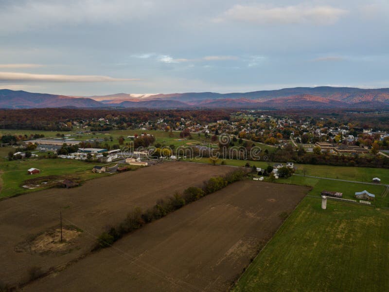 Aerial of the small town of Elkton, Virginia in the Shenandoah Valley with Mountains in the Far Distance. Aerial of the small town of Elkton, Virginia in the Shenandoah Valley with Mountains in the Far Distance