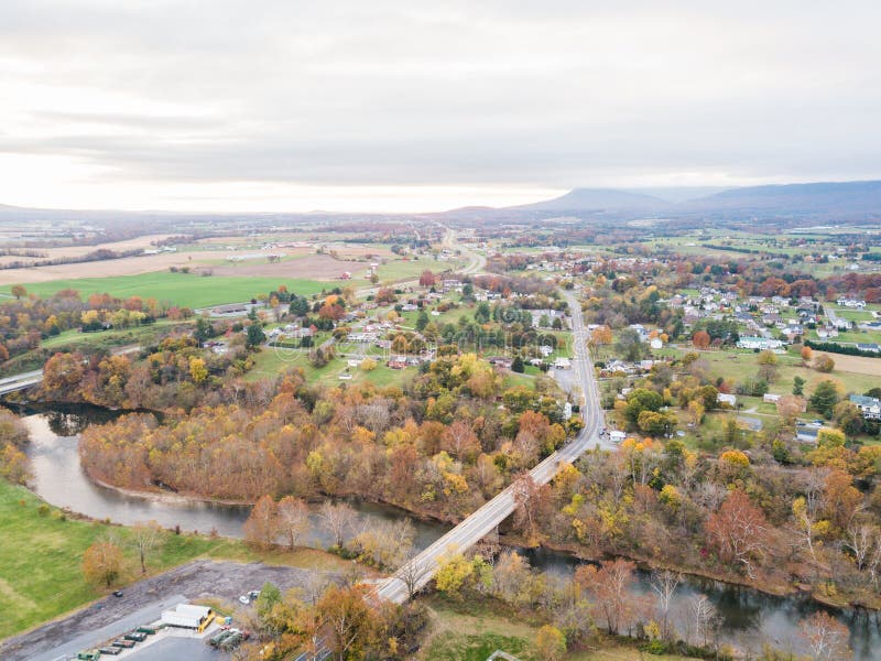 Aerial of the small town of Elkton, Virginia in the Shenandoah Valley with Mountains in the Far Distance. Aerial of the small town of Elkton, Virginia in the Shenandoah Valley with Mountains in the Far Distance