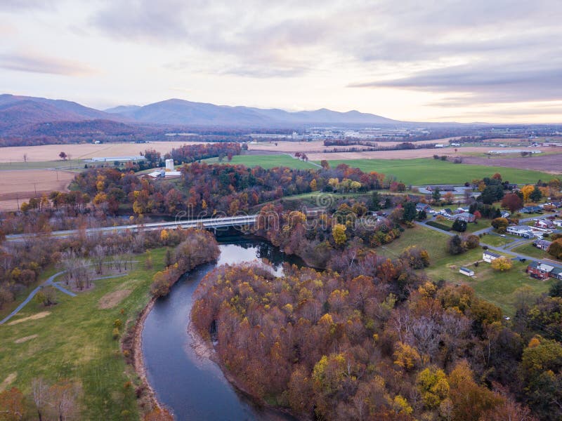 Aerial of the small town of Elkton, Virginia in the Shenandoah Valley with Mountains in the Far Distance. Aerial of the small town of Elkton, Virginia in the Shenandoah Valley with Mountains in the Far Distance