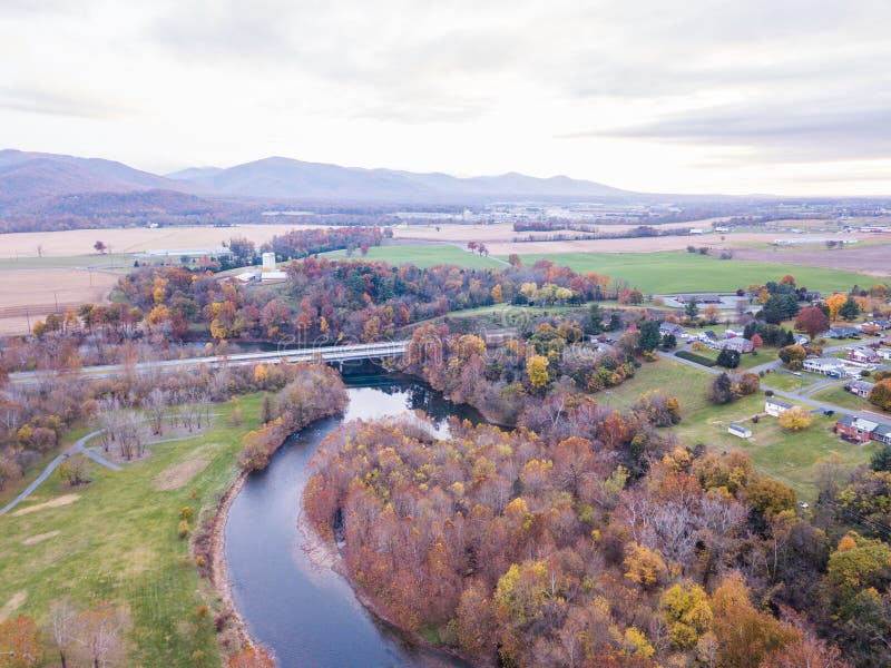 Aerial of the small town of Elkton, Virginia in the Shenandoah Valley with Mountains in the Far Distance. Aerial of the small town of Elkton, Virginia in the Shenandoah Valley with Mountains in the Far Distance