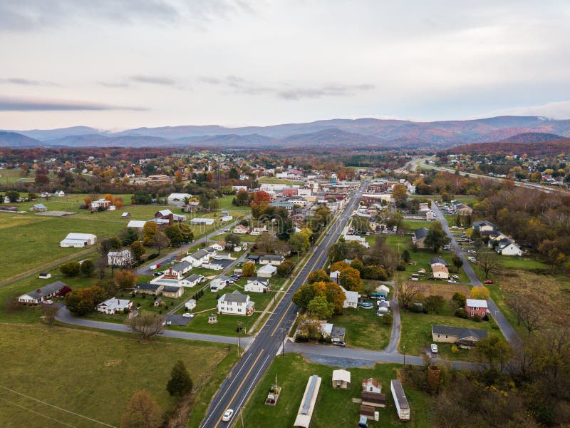 Aerial of the small town of Elkton, Virginia in the Shenandoah Valley with Mountains in the Far Distance. Aerial of the small town of Elkton, Virginia in the Shenandoah Valley with Mountains in the Far Distance