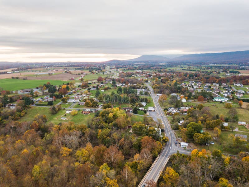 Aerial of the small town of Elkton, Virginia in the Shenandoah Valley with Mountains in the Far Distance. Aerial of the small town of Elkton, Virginia in the Shenandoah Valley with Mountains in the Far Distance