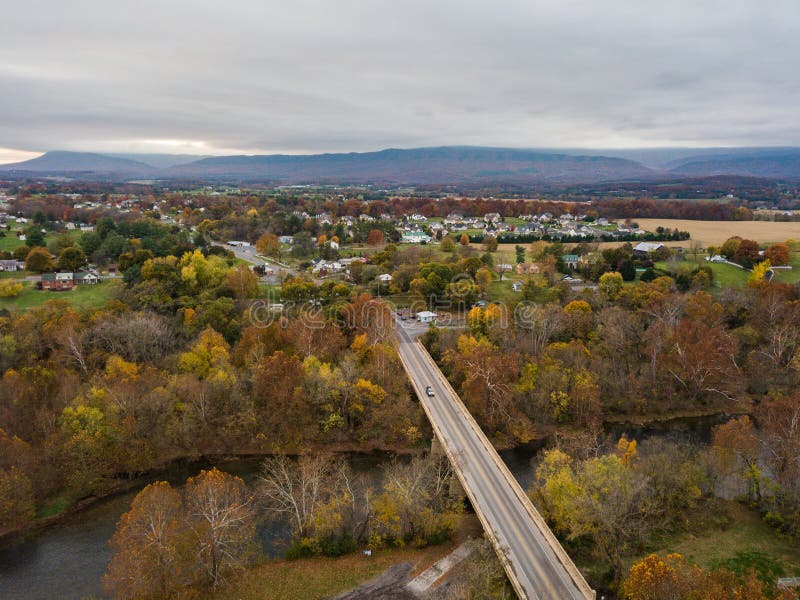 Aerial of the small town of Elkton, Virginia in the Shenandoah Valley with Mountains in the Far Distance. Aerial of the small town of Elkton, Virginia in the Shenandoah Valley with Mountains in the Far Distance