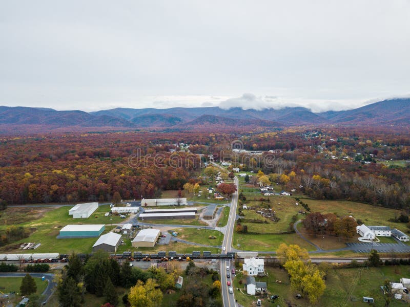 Aerial of the small town of Elkton, Virginia in the Shenandoah Valley with Mountains in the Far Distance. Aerial of the small town of Elkton, Virginia in the Shenandoah Valley with Mountains in the Far Distance