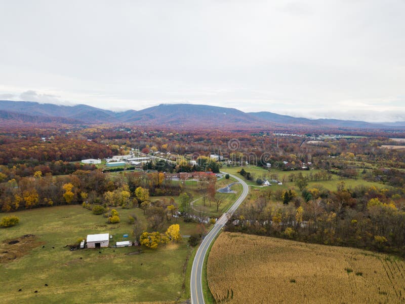 Aerial of the small town of Elkton, Virginia in the Shenandoah Valley with Mountains in the Far Distance. Aerial of the small town of Elkton, Virginia in the Shenandoah Valley with Mountains in the Far Distance