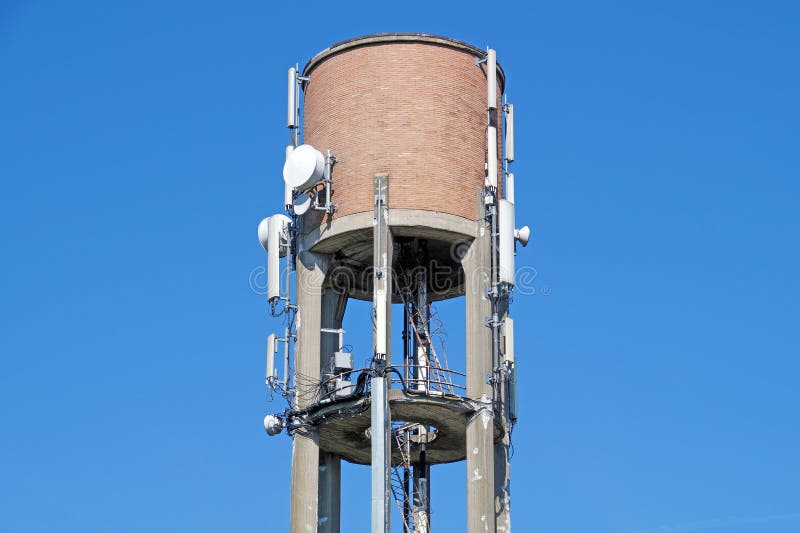 Antenna installed on top of water tower stock image