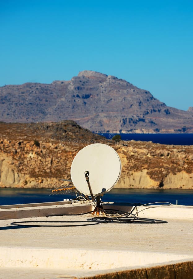 Antenna and satellite dish. On the roof