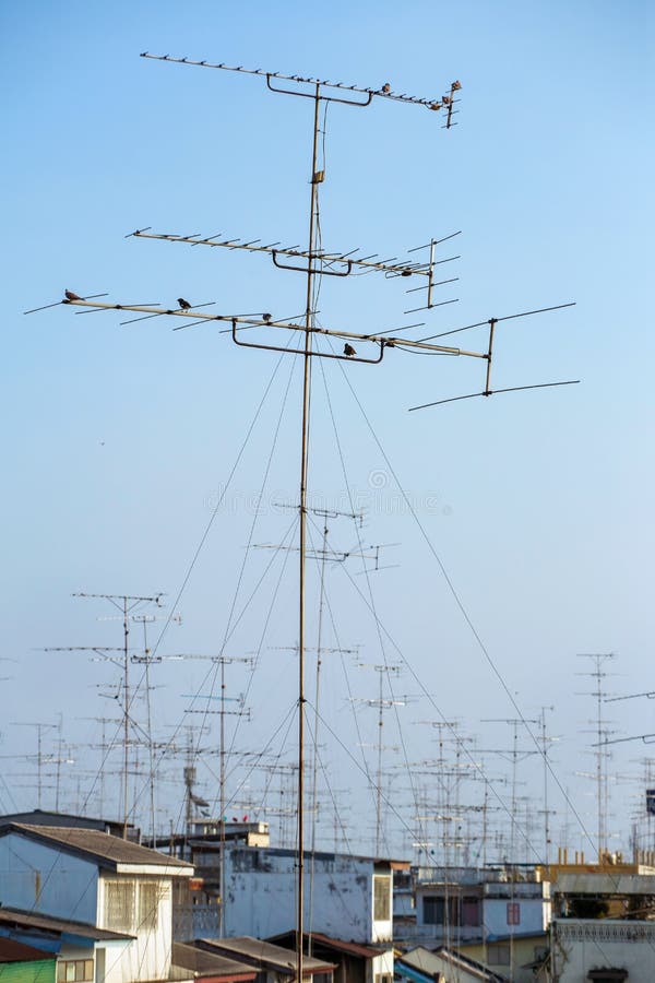 Antennas on the roof stock image. Image of antenna,