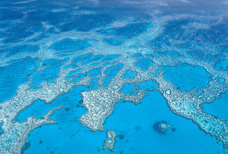 Antenne van Hardy Coral Reef bij de Pinkstereneilanden dat binnen wordt geschoten royalty-vrije stock afbeelding Antenne van Hardy Coral Reef bij de Pinkstereneilanden dat binnen wordt geschoten royalty-vrije stock afbeelding