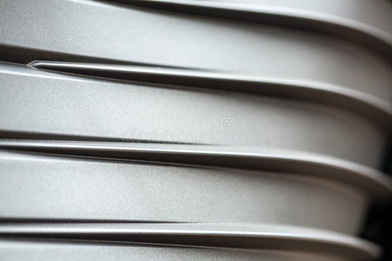 Anthracite colored surface from the detail photo of a motorcycle royalty free stock photo