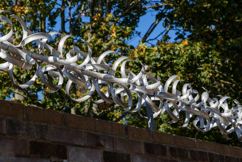 Anti Climbing Device on the Top of a Brick Wall Stock Photo Image of
