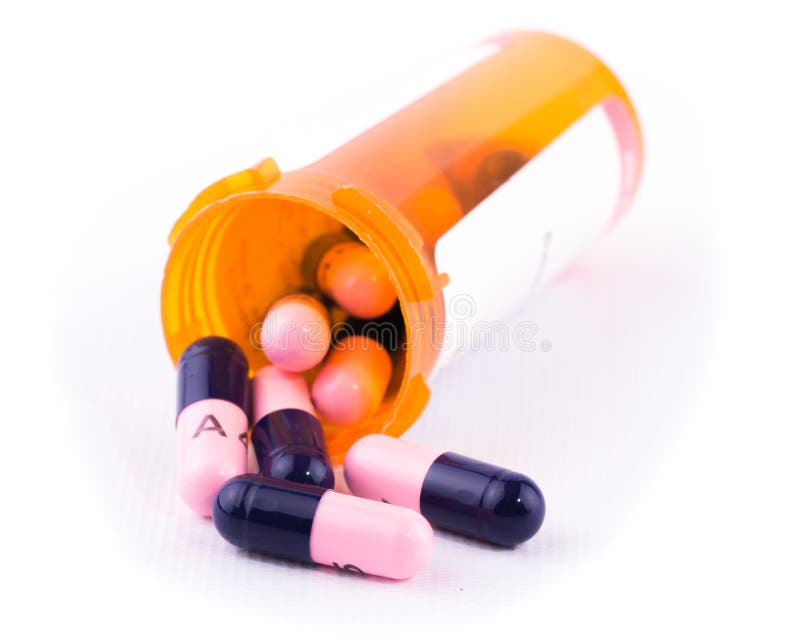Antibiotics spilling out of a prescription bottle royalty free stock photo Antibiotics spilling out of a prescription bottle royalty free stock photo