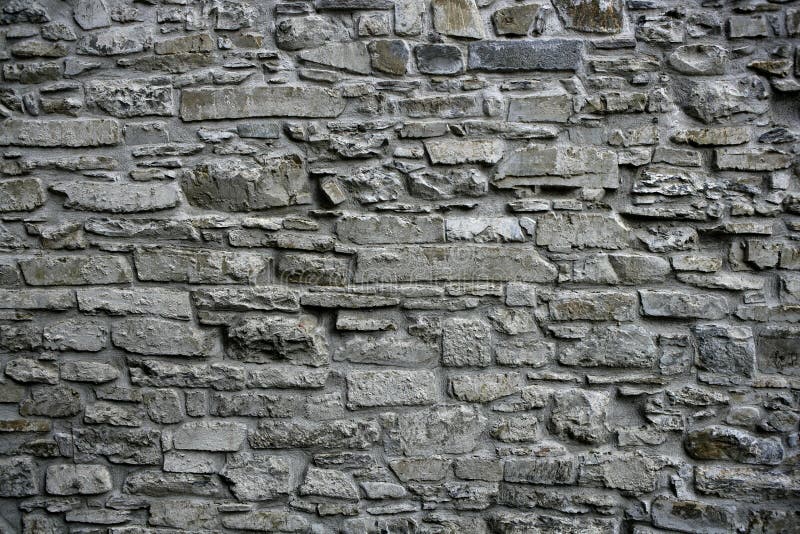 Antiek de muurmetselwerk van de grunge oud grijs steen